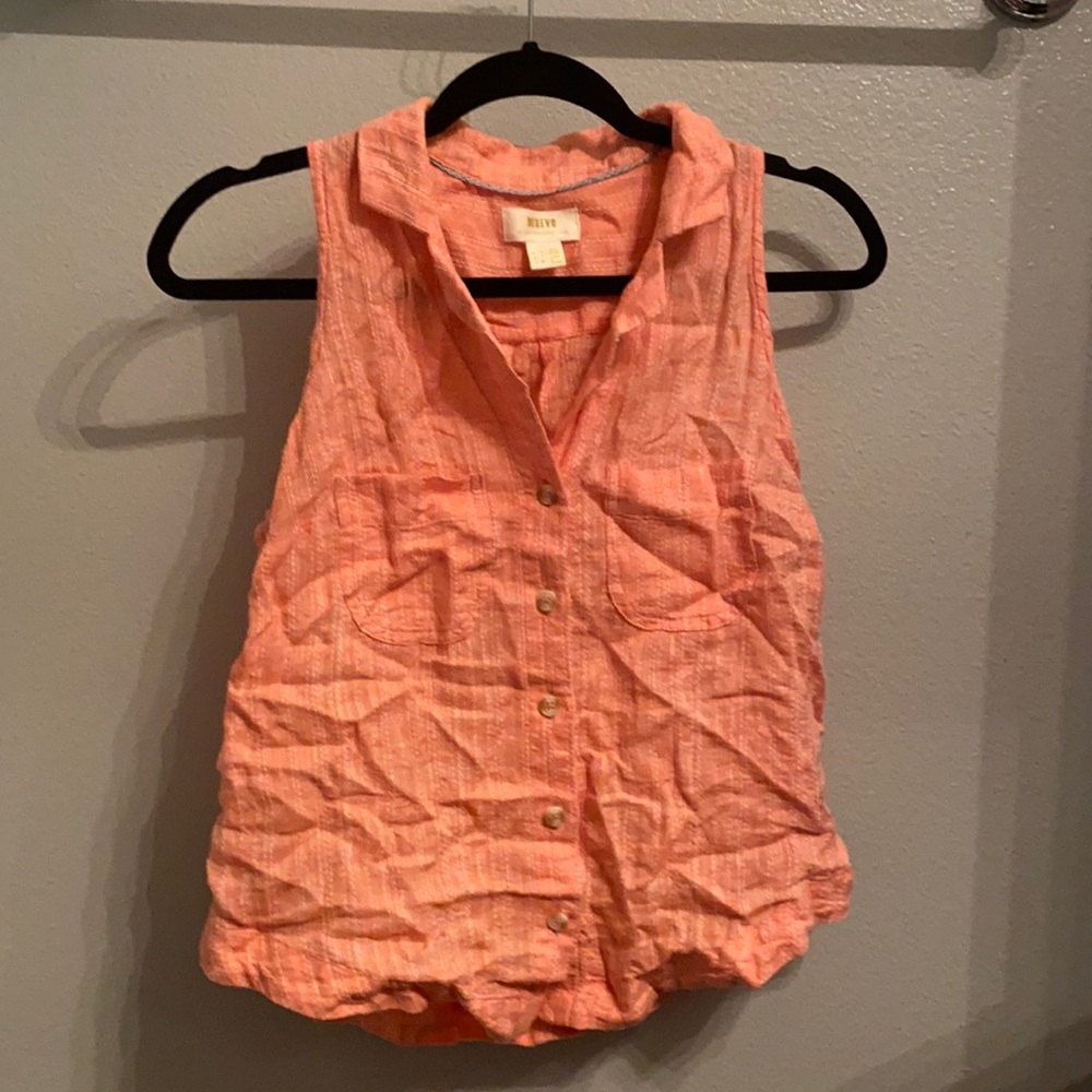 Short button down with white stitching.